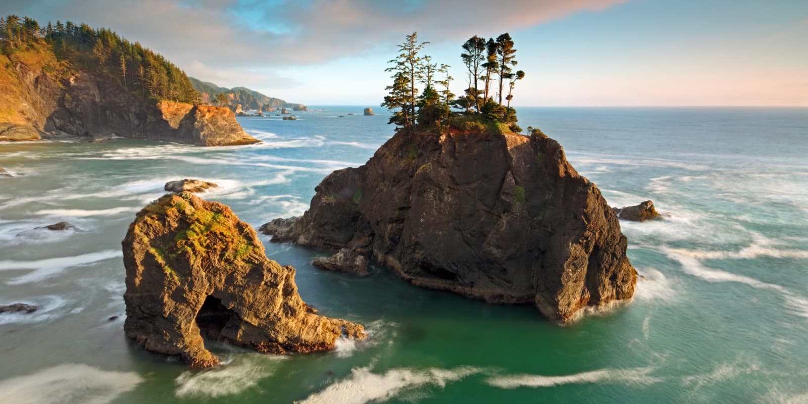 Sea stacks at Samuel H. Boardman State Scenic Corridor at golden hour