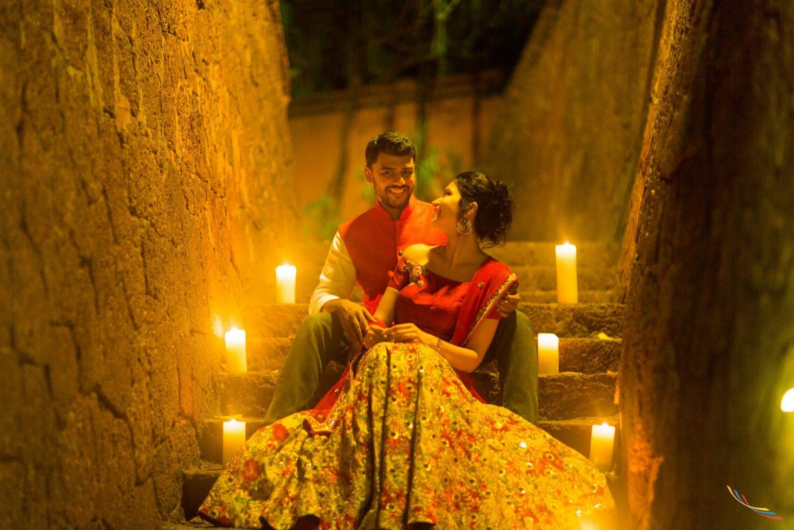 A candlelit reception in rich, warm tones